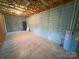 Large unfinished basement with block walls, water heater, and concrete floor at 904 3Rd Street Ne Pl, Conover, NC 28613