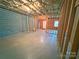 Unfinished basement with concrete floor, block walls, and exposed ceiling at 904 3Rd Street Ne Pl, Conover, NC 28613