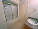 Tiled bathroom with shower-tub combo and single sink vanity at 904 3Rd Street Ne Pl, Conover, NC 28613