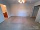 Bedroom with fan, closet, and attached bathroom at 904 3Rd Street Ne Pl, Conover, NC 28613