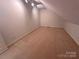 Neutral bedroom with carpeted floors and slanted ceiling at 904 3Rd Street Ne Pl, Conover, NC 28613
