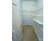 Large walk-in closet with ample shelving for storage at 904 3Rd Street Ne Pl, Conover, NC 28613
