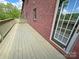 The home has a wooden deck accessible through the exterior door at 904 3Rd Street Ne Pl, Conover, NC 28613