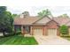 Charming brick home with a two-car garage and a well-manicured lawn at 904 3Rd Street Ne Pl, Conover, NC 28613