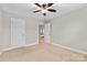 Bedroom featuring carpet flooring and an open doorway at 9303 Raven Top Dr, Mint Hill, NC 28227
