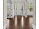 Elegant entryway with white trim, a modern door, and views to the outside at 9303 Raven Top Dr, Mint Hill, NC 28227