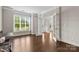 Bright home office with hardwood floors, large windows, and glass paneled French doors at 9303 Raven Top Dr, Mint Hill, NC 28227