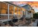 Outdoor patio features a stone surface, seating, and a grill for entertaining at 9803 Tree Canopy Rd, Charlotte, NC 28277