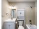 Bathroom featuring a single sink vanity, toilet, storage cabinet, and shower-over-tub at 109 Georgia Belle Ave # 199, Belmont, NC 28012