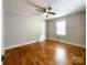 Bedroom with hardwood flooring, ceiling fan, white trim, and a double window letting in light at 109 Georgia Belle Ave # 199, Belmont, NC 28012