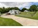 Full exterior view showcasing the home's layout, fenced yard, and curb appeal at 109 Georgia Belle Ave # 199, Belmont, NC 28012