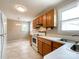 Well-lit kitchen with updated appliances, wooden cabinets, and a bright breakfast nook at 109 Georgia Belle Ave # 199, Belmont, NC 28012