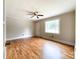 Bright living room with hardwood floors and natural light from the large window at 109 Georgia Belle Ave # 199, Belmont, NC 28012
