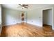 Inviting living room with hardwood floors, a ceiling fan, and a doorway leading to other rooms at 109 Georgia Belle Ave # 199, Belmont, NC 28012