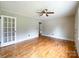 Inviting living room featuring hardwood floors and a classic ceiling fan at 109 Georgia Belle Ave # 199, Belmont, NC 28012
