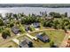 Stunning aerial view of waterfront homes nestled along a serene lakefront community at 11228 Island View Ln, Lancaster, SC 29720