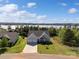 Aerial view of a charming home with beautiful yard and lake view at 11228 Island View Ln, Lancaster, SC 29720