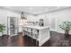 Bright kitchen featuring a center island with bar stool seating and stainless steel appliances at 11228 Island View Ln, Lancaster, SC 29720