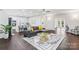 Open-concept living area featuring dark hardwood floors and an inviting lounge area at 11228 Island View Ln, Lancaster, SC 29720