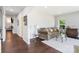 Cozy living room showcasing hardwood floors, neutral walls, and an inviting sofa at 11228 Island View Ln, Lancaster, SC 29720