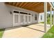 Concrete patio with walkout, neutral paint, lighting, and ceiling detail at 11228 Island View Ln, Lancaster, SC 29720