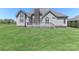 Spacious backyard features a large deck perfect for outdoor entertaining and relaxing at 115 Players Park Cir, Statesville, NC 28677