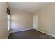 Standard, carpeted bedroom with view of the backyard at 115 Players Park Cir, Statesville, NC 28677