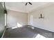 Inviting bedroom with neutral walls, plush carpeting, and bright natural light at 115 Players Park Cir, Statesville, NC 28677