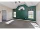 Spacious bedroom with ample natural light and neutral carpeting at 115 Players Park Cir, Statesville, NC 28677