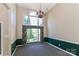 Dining room featuring a large window, chandelier, carpet and wainscoting at 115 Players Park Cir, Statesville, NC 28677