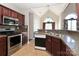 Kitchen featuring stainless steel appliances and granite countertops at 115 Players Park Cir, Statesville, NC 28677