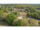 An aerial view of a residential neighborhood featuring houses surrounded by lush green trees at 1195 Ralph B Keener Rd, Lincolnton, NC 28092