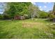 Spacious backyard with a shed and plenty of green space, perfect for outdoor activities at 1195 Ralph B Keener Rd, Lincolnton, NC 28092
