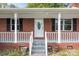 Charming brick home with black shutters and a welcoming front porch at 1195 Ralph B Keener Rd, Lincolnton, NC 28092