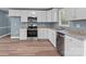 Well-lit kitchen boasts stainless steel appliances and granite countertops at 1195 Ralph B Keener Rd, Lincolnton, NC 28092