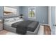 Cozy main bedroom features soft lighting, fresh paint, and a view to the backyard at 1195 Ralph B Keener Rd, Lincolnton, NC 28092