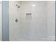 The bathroom features a tiled shower with a shower niche at 1195 Ralph B Keener Rd, Lincolnton, NC 28092