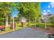 The back yard is shaded and features a shed at 12305 Portrush Ln, Charlotte, NC 28273