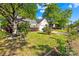 Well-kept front yard with vibrant landscaping and mature trees, enhancing the curb appeal of this delightful home at 12305 Portrush Ln, Charlotte, NC 28273