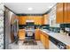 Functional kitchen featuring stainless steel appliances and ample cabinet space at 12305 Portrush Ln, Charlotte, NC 28273