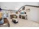 Comfortable living room with a ceiling fan and access to the dining area at 12305 Portrush Ln, Charlotte, NC 28273