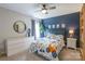 Cozy ' bedroom with modern decor and a playful atmosphere at 13015 Rothe House Rd, Charlotte, NC 28273