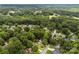 An aerial view of the community, featuring tree-lined streets and picturesque homes at 13324 Kintyre Ct, Matthews, NC 28105