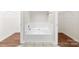 Bathroom with large tub and nice tilework at 13324 Kintyre Ct, Matthews, NC 28105