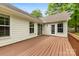 A backyard deck with sliding glass doors to the interior at 13324 Kintyre Ct, Matthews, NC 28105