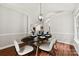 Dining room with modern table and stylish chairs. Dining area with lots of space and light at 13324 Kintyre Ct, Matthews, NC 28105