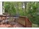 Backyard deck with metal table and chairs providing an outdoor dining space at 139 High Ridge Rd, Mooresville, NC 28117