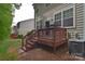 Backyard deck with stairs, attached to siding of home, providing an outdoor living space at 139 High Ridge Rd, Mooresville, NC 28117