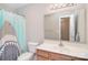 Bathroom with a shower curtain with a shark design and double sink vanity at 139 High Ridge Rd, Mooresville, NC 28117