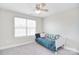 Bright bedroom with light gray walls and plush carpet featuring a bed at 139 High Ridge Rd, Mooresville, NC 28117